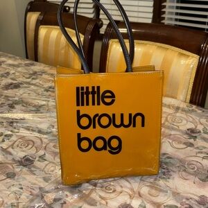 Bloomingdale’s Little brown bag